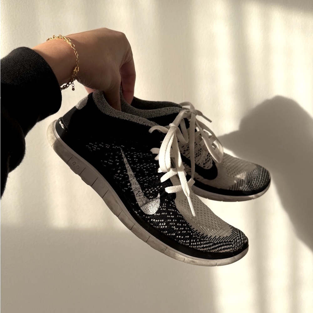Nike Free 4.0 running shoes in Black and White
